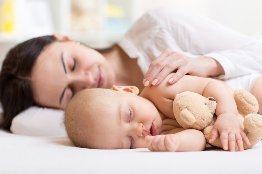 A mother and her baby taking a Postnatal Nap.