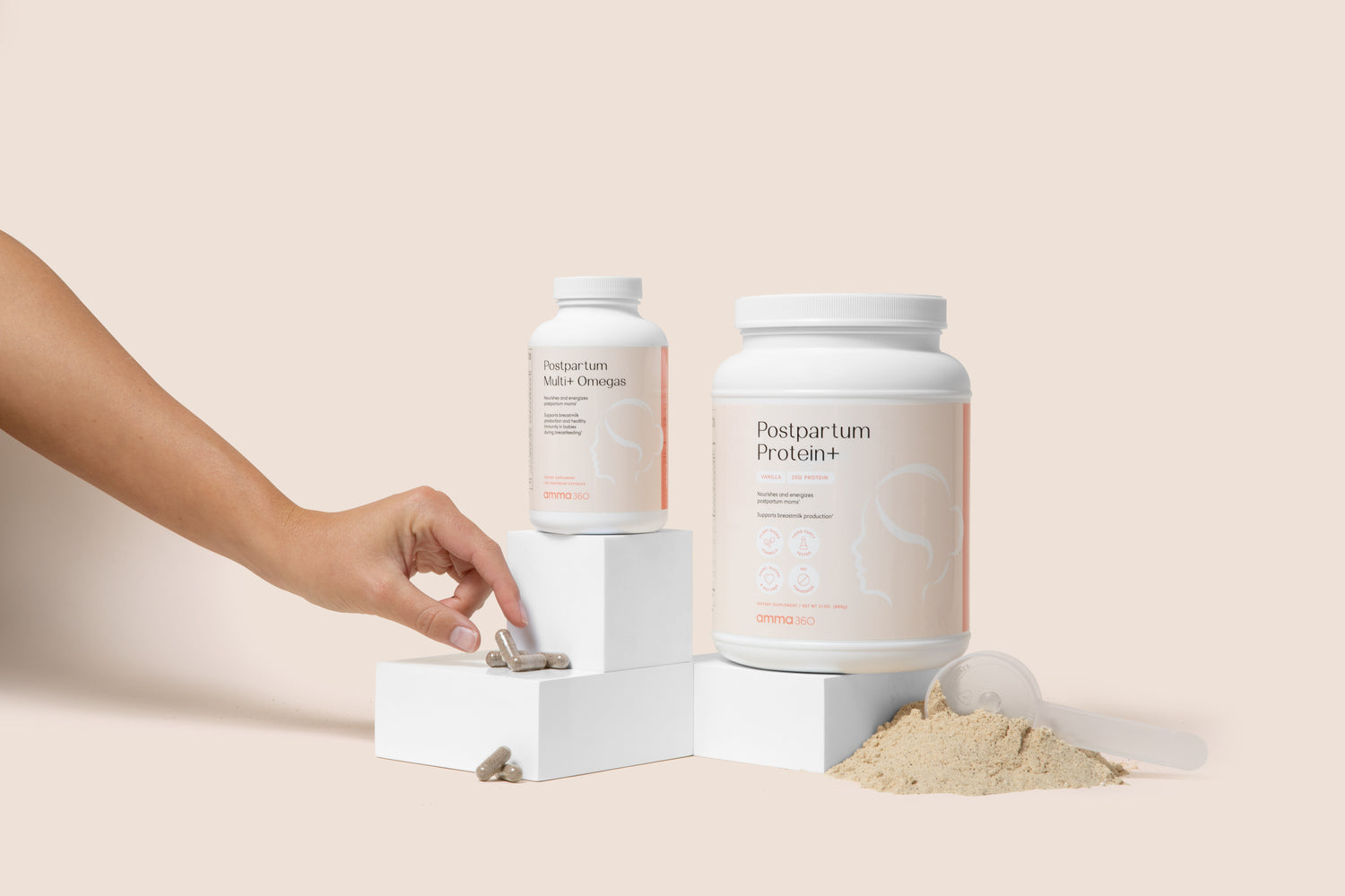 Postpartum product bundle image with hand reaching for capsule and protein powder